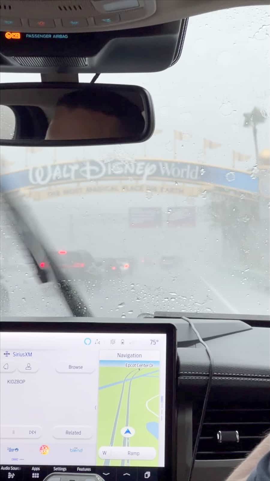 Driving to Walt Disney World from MCO Airport in a rideshare Uber while it is raining