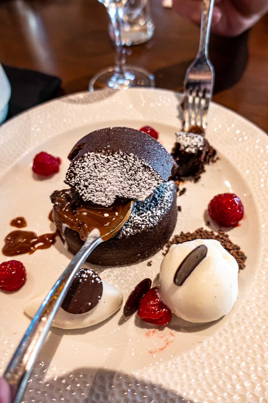 Eating the Chocolate Cake from Dessert Menu at Topolino's Terrace Disney World Restaurant 