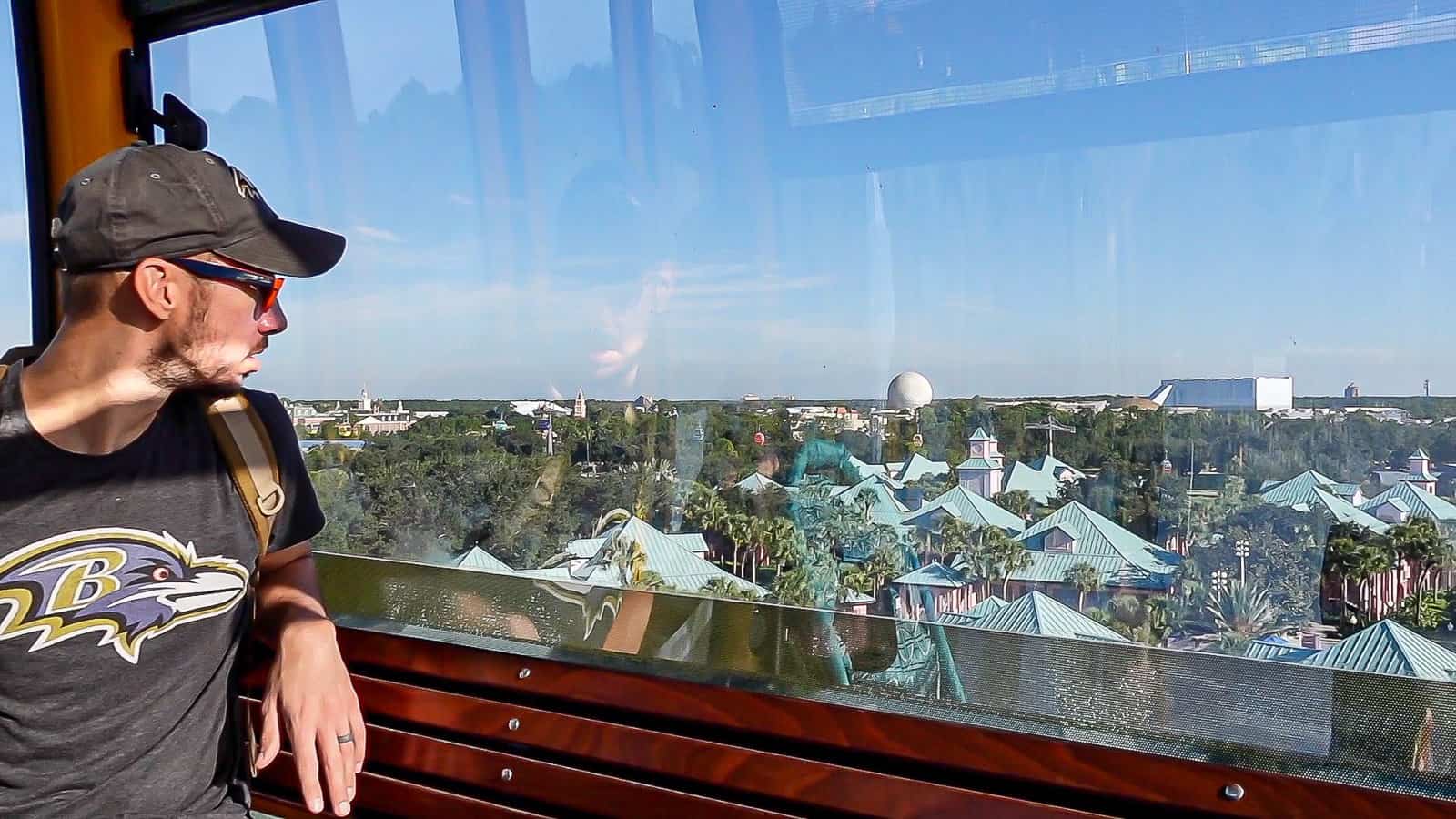 Riding Disney Skyliner transportation to Epcot theme park over resorts