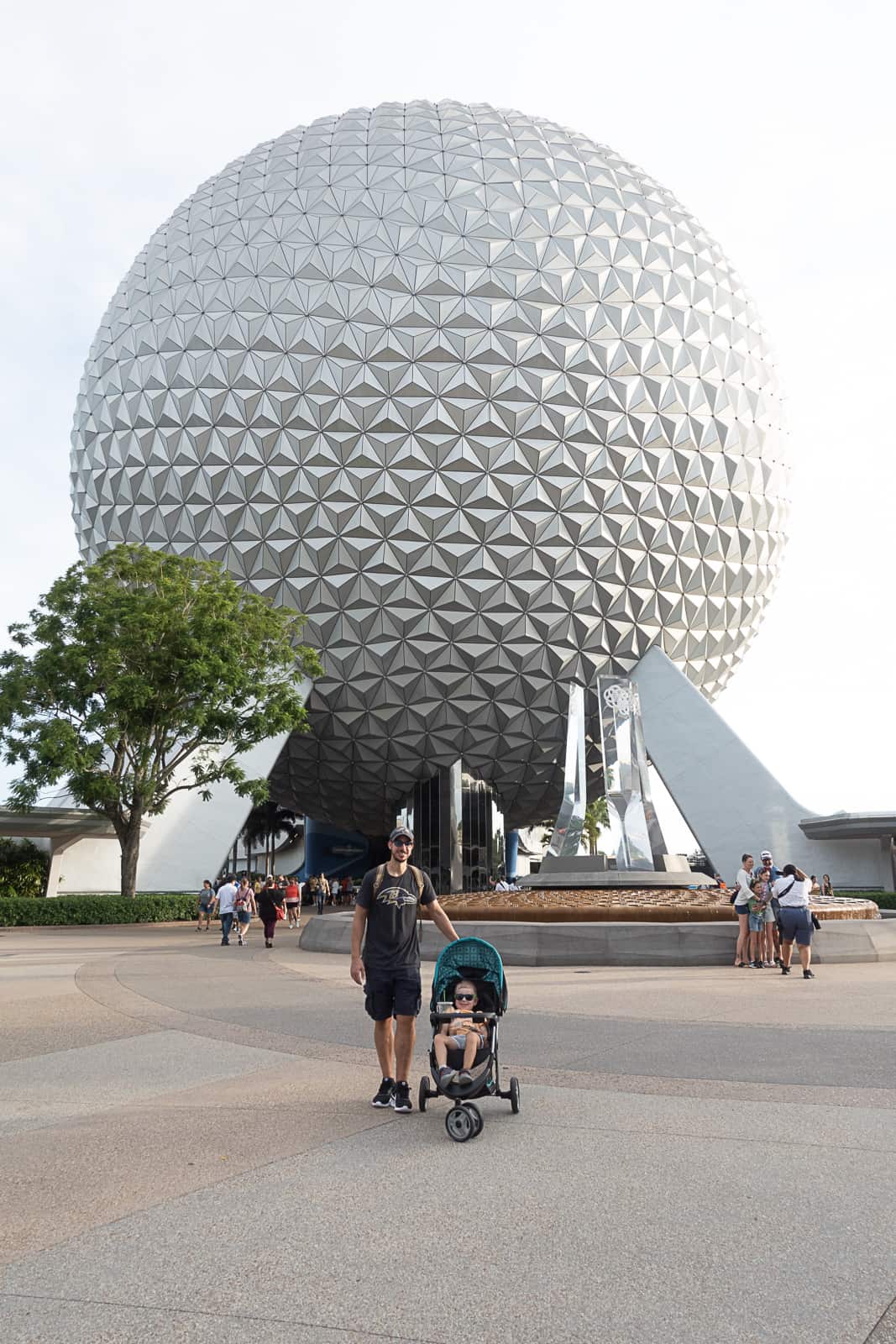 Main Epcot Entrance family with stroller