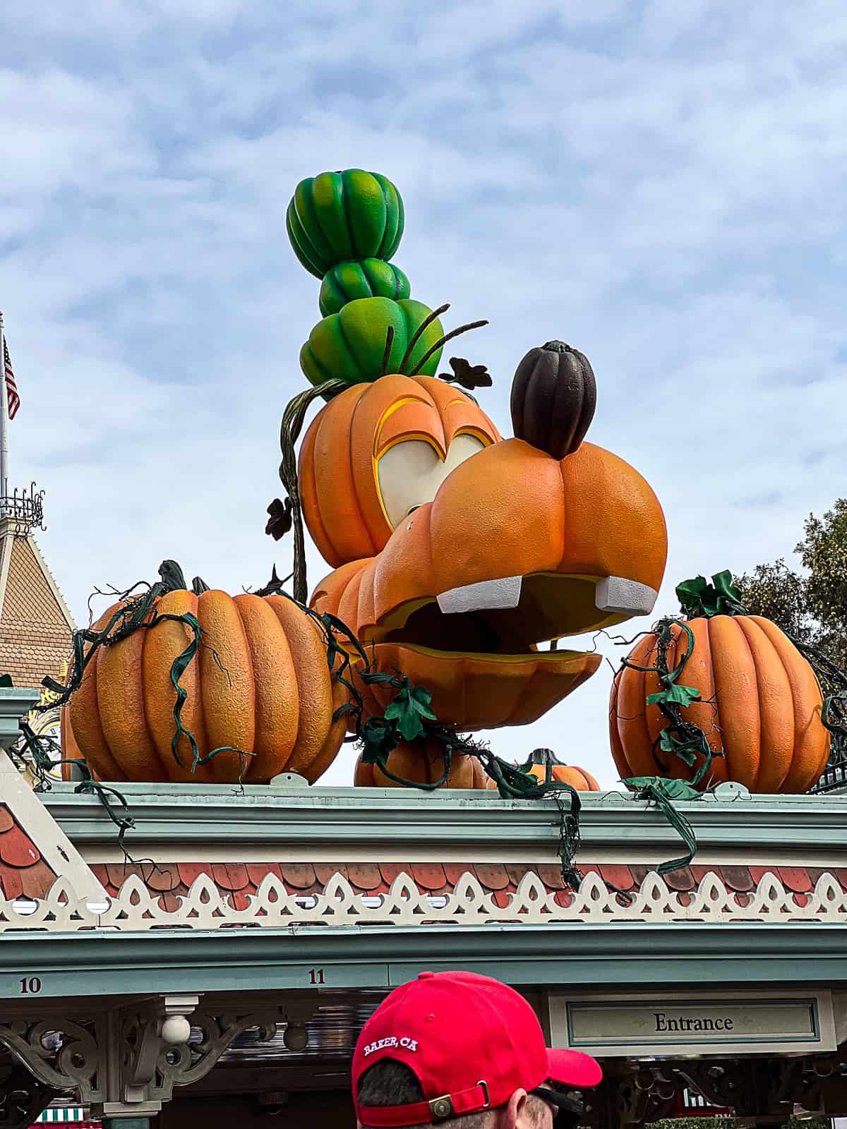 Disney Park Halloween Decor Pluto Pumpkins at ticket entrance