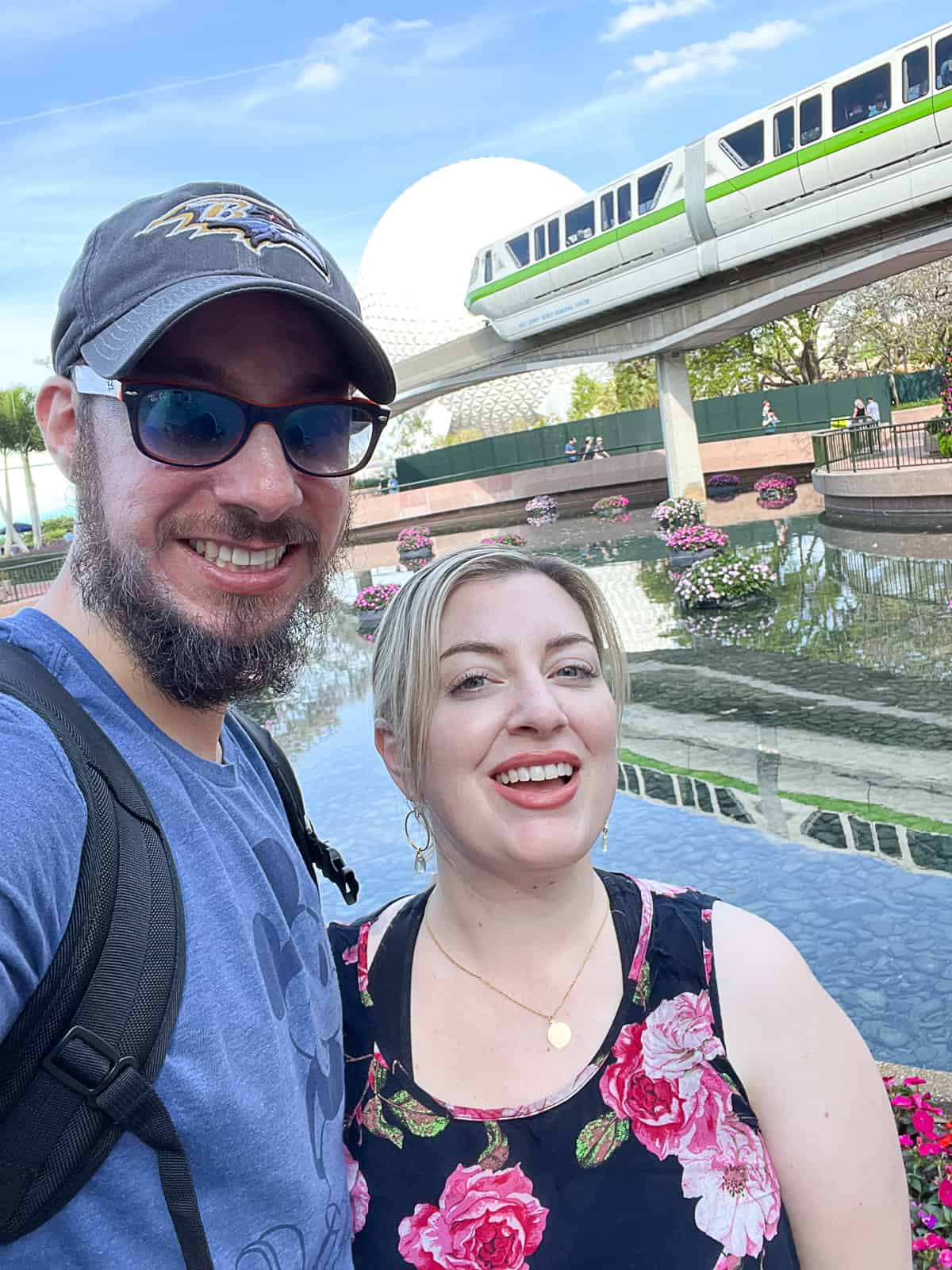 Disney Vacation Tourists near of Monorail and Epcot Ball