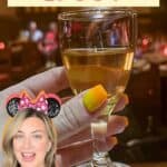 Ice Wine Tasting in EPCOT Foodie restaurant le cellier with jenna passaro travel blogger and jenna loves magic logo