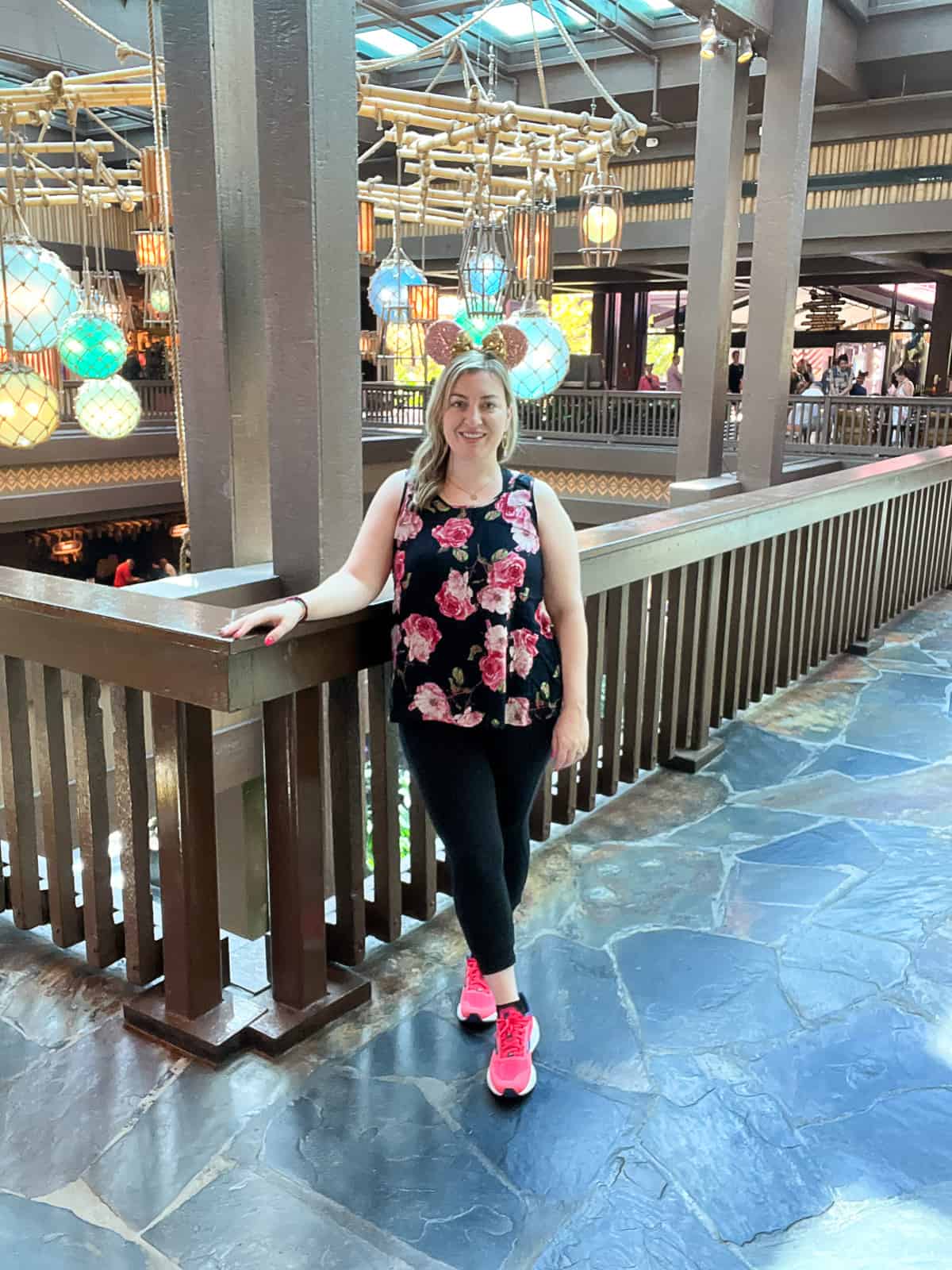 Jenna Passaro Disney Travel Agent standing inside Disney World Polynesian Village Resort