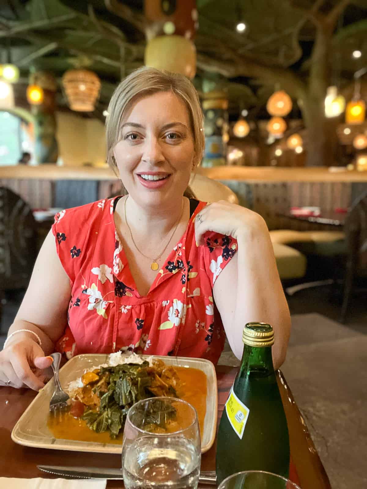 Jenna Passaro Disney World Food Blogger eating at Sanaa Restaurant in Animal Kingdom Lodge