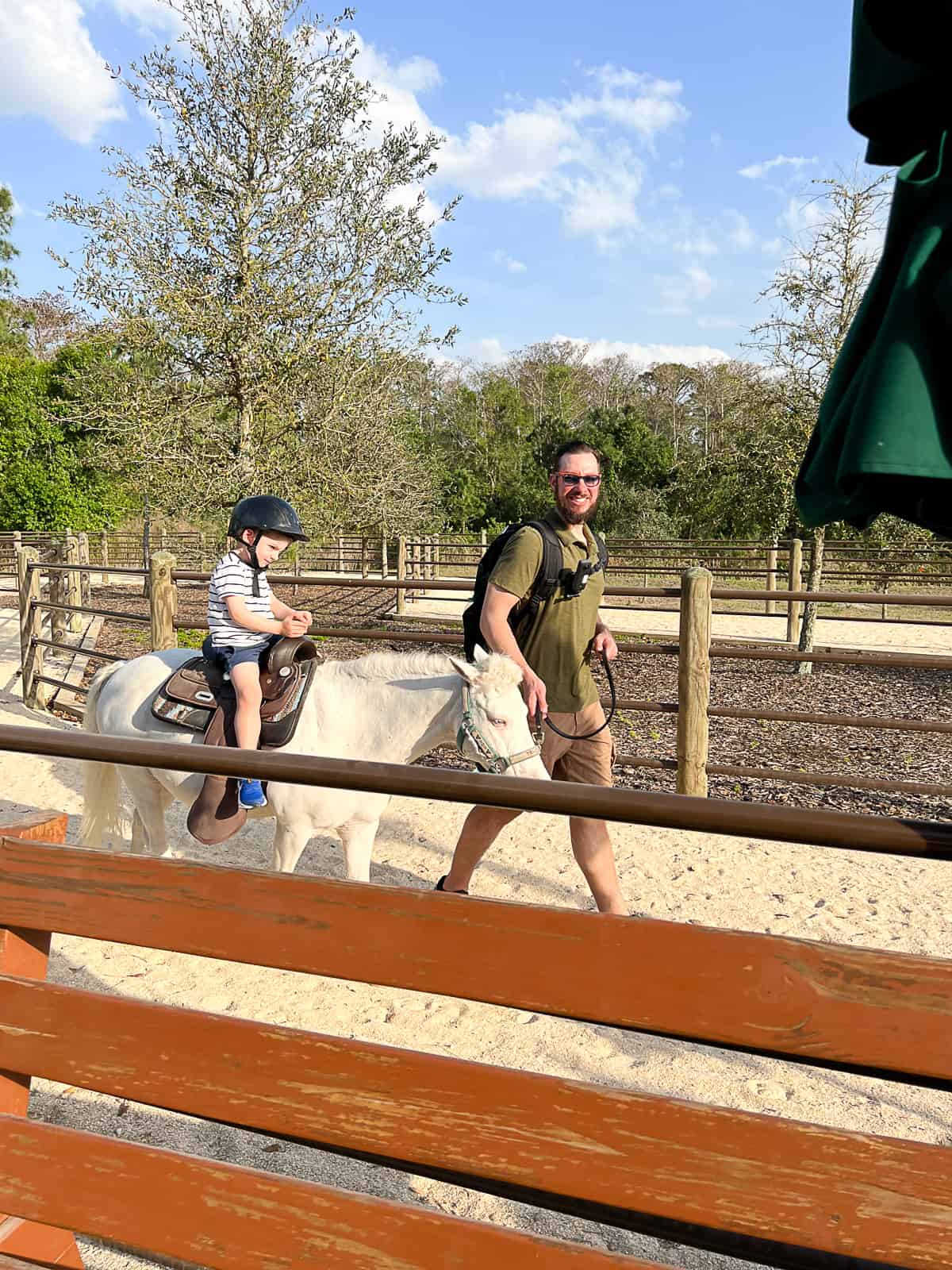 Kid horseback riding activity at Tri-Circle-D Ranch at The Cabins at Fort Wilderness Resort