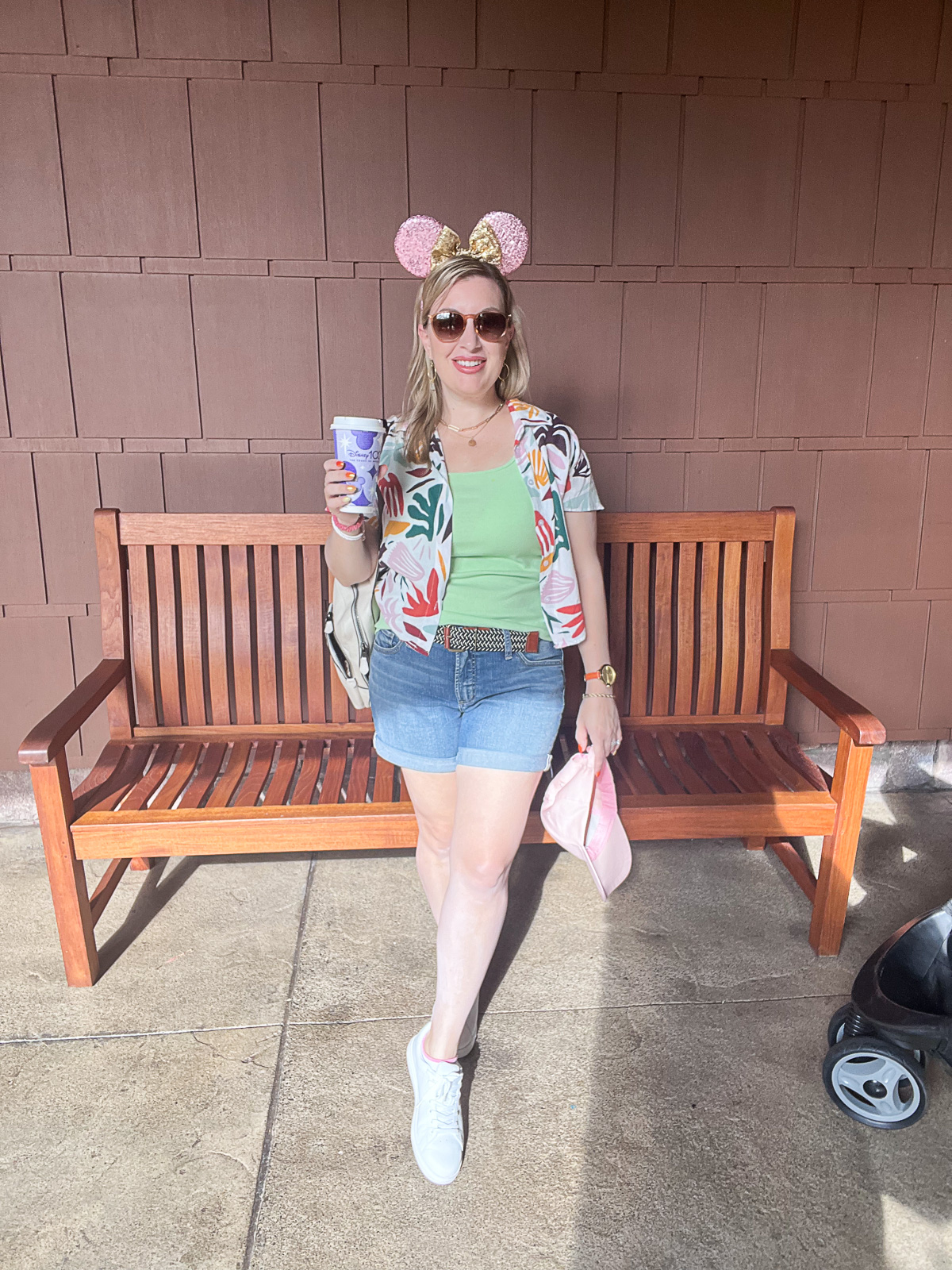Disney Food Blogger holding coffee outside Grand Californian Hotel