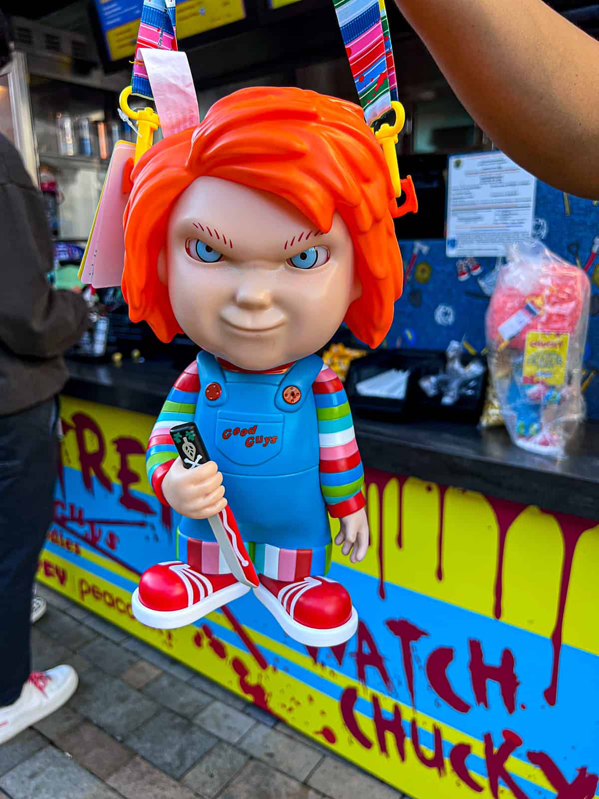Holding a Universal Studios Chucky Popcorn Holder from Halloween Horror Nights